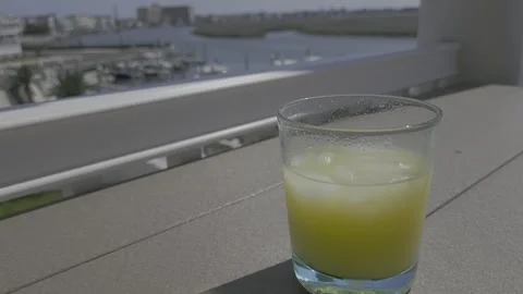 A Drink On A Deck Over Water Vidéo 243062182