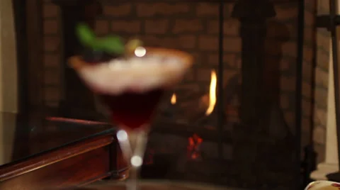 Drink by the fire Stock Footage 29240664