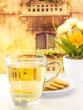 Drink hot tea with cracker Stock Photos