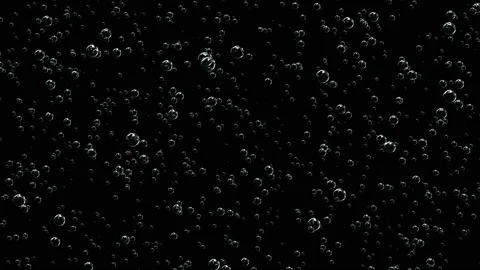 The drink with lots of bubbles. Animation of bubbles moving up on a black Stock Footage 114798639