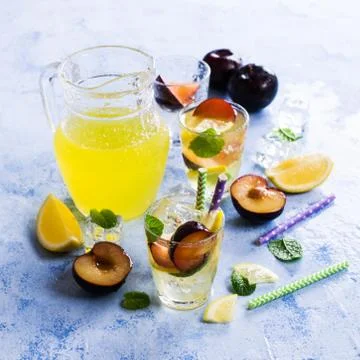 Drink with plums Stock Photos