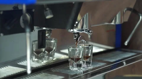 The drink is poured into glasses in the bar Stock Footage 159897874