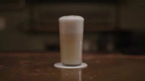 A drink on a table Stock Footage 137671620