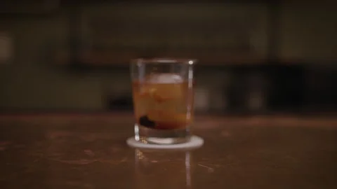 A drink on a table Stock Footage 137672308