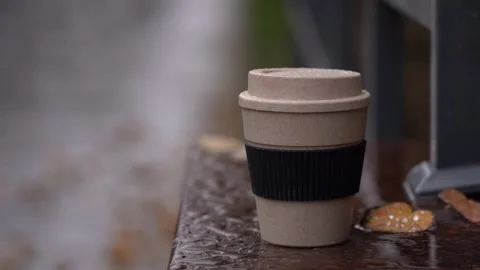 Drink warm drinks in cold weather. autumn leaves and coffee cup under autumn Stock Footage 255438494