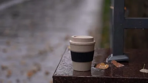 Drink warm drinks in cold weather. autumn leaves and coffee cup Stock Footage 275646806