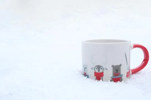 A drink while walking on a cold winter day. Blank space for ad text Stock Photos