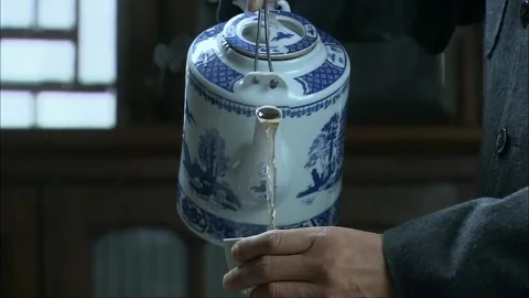 "Drinking and savoring tea in the teahouse." Stock Footage 261639965