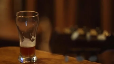 Drinking beer and playing guitar Stock Footage 133206829
