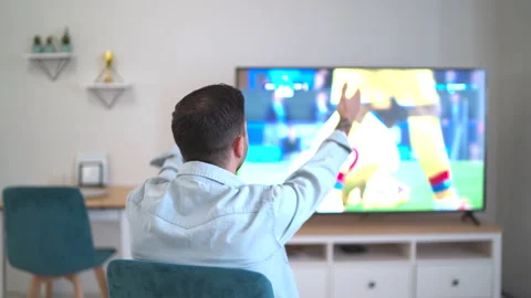 Drinking beer and watching soccer in qatar at home Stock Footage 220415248