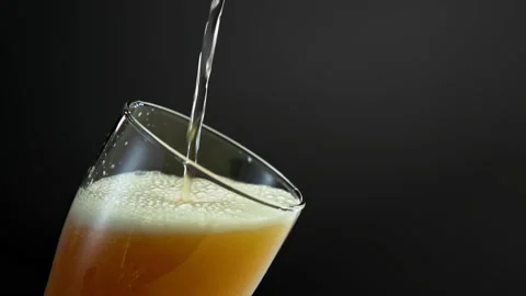 Drinking Beer Brew or Bubbly Alcohol Beverage from Glass Cup at Culture Party Stock Footage 236371818