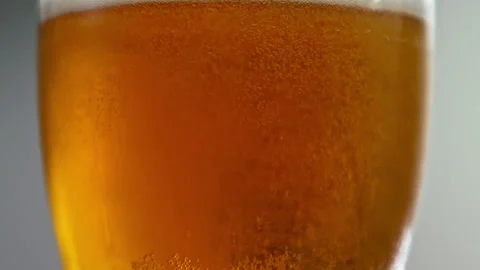 Drinking Beer Brew or Bubbly Alcohol Beverage from Glass Cup at Culture Party Stock Footage 243895381