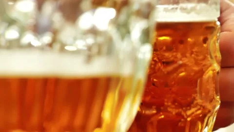 Drinking beer is a process.Two people are drinking beer Stock Footage 340105707