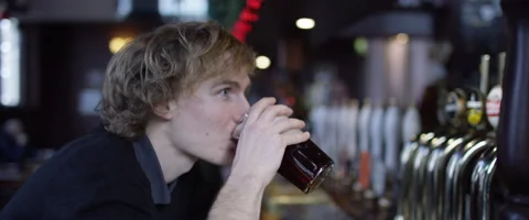 Drinking a beer in a pub Stock Footage 59945896
