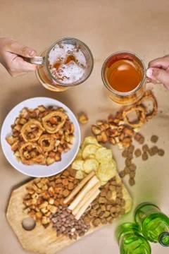 Drinking beer. Table full of beer snacks Stock Photos