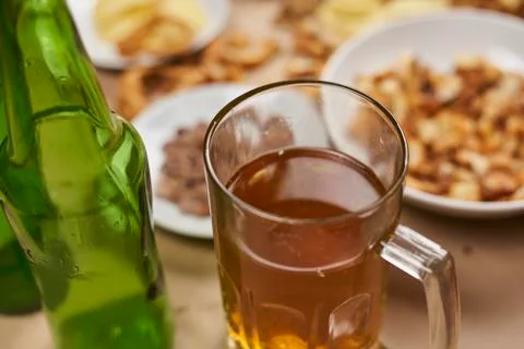 Drinking beer. Table full of beer snacks Stock Photos
