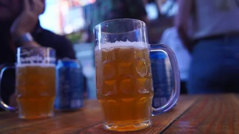 Drinking Beer from Table Shallow Depth of Field Video stock 92079987
