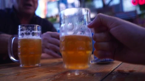 Drinking Beer from Table Shallow Depth of Field Video stock 92080086