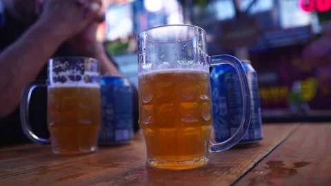 Drinking Beer from Table Shallow Depth of Field Stock Footage 92080286
