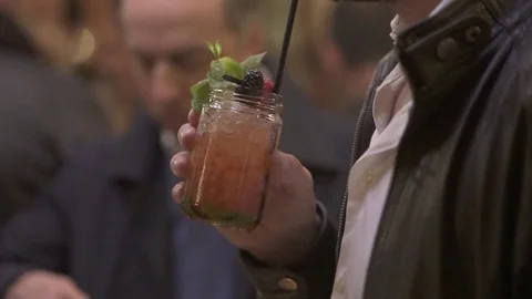 Drinking a cocktail Stock Footage 82027147