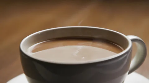 Drinking Coffee Beverage with White Milk from Espresso Cup at Morning Breakfast Video stock 252560717