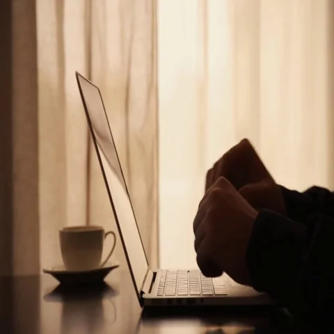 Drinking coffee with laptop Stock Footage