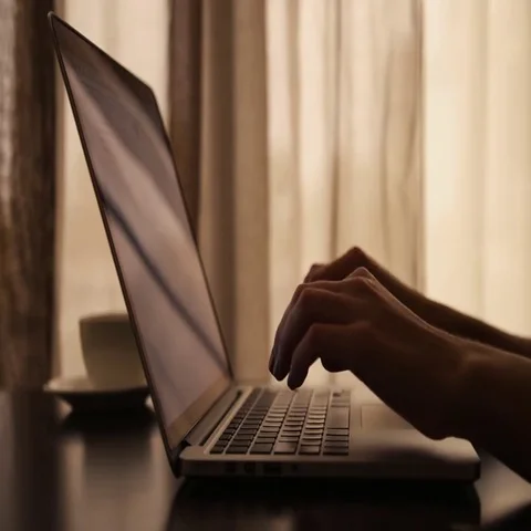 Drinking coffee with laptop Stock Footage 69575875