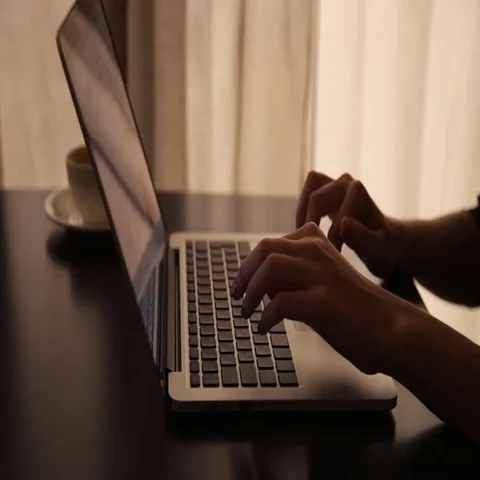 Drinking coffee with laptop Stock Footage 69576196