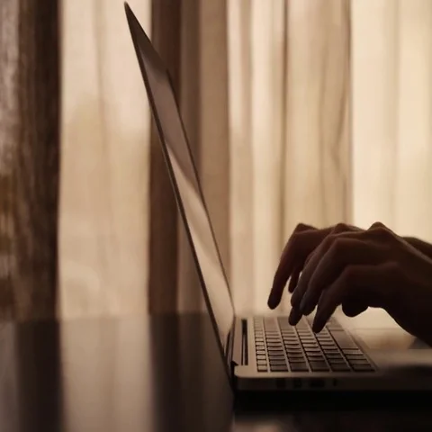 Drinking coffee with laptop Stock Footage 69576311