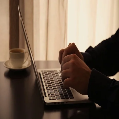 Drinking coffee with laptop Stock Footage 69576318