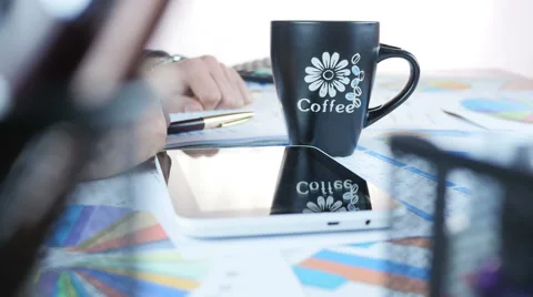 Drinking Coffee In Office Stockbeeldmateriaal 64058052