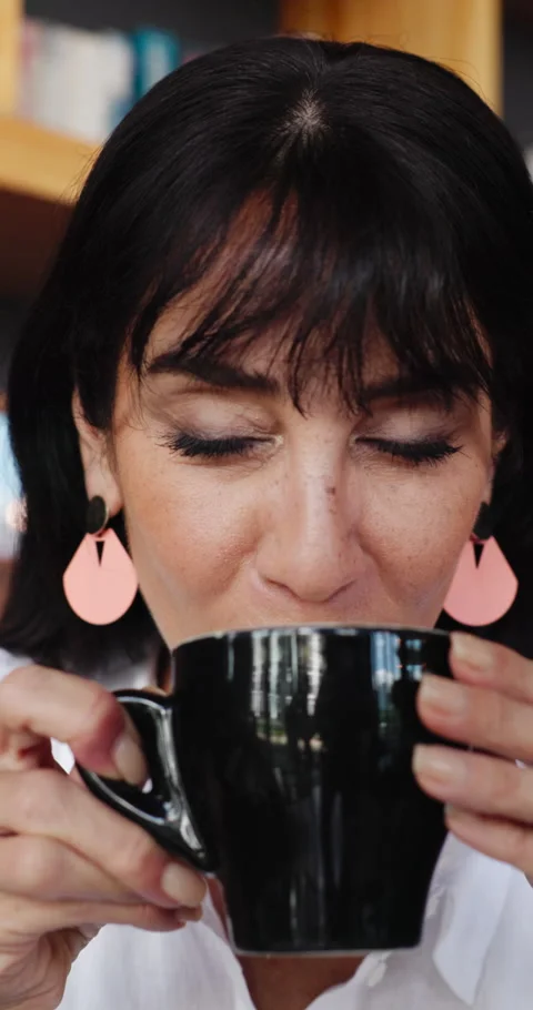 Drinking coffee, thinking and woman in cafe, relax and reflection for memory, Stock Footage 330585565