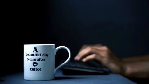 Drinking coffee while working Stock Footage 121348270