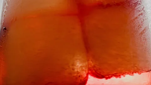 Drinking Coke Beverage or Cold Bubbly Liquid Filling Glass Cup with Ice Cubes Stock Footage 237817947