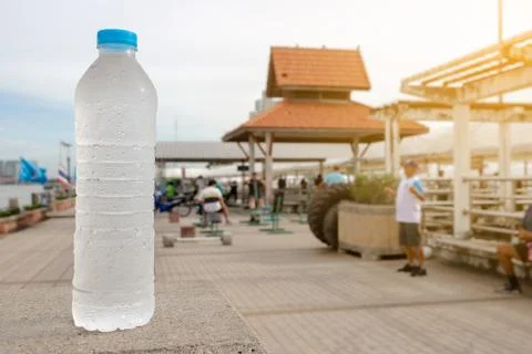 Drinking cold water after exercise.to make the body refreshing Stock Photos