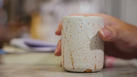 Drinking cup of hot boiled tea Stock Footage 99964375