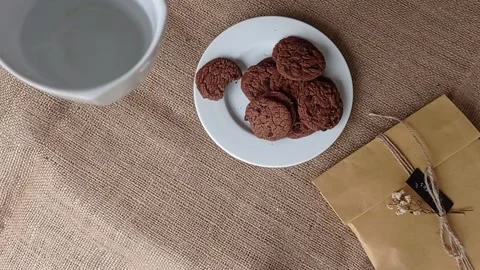 Drinking a cups of water after eating the biscuit Stock Footage 150398937