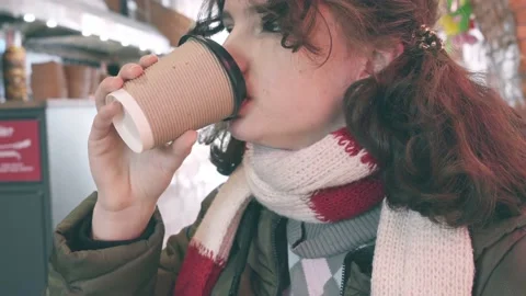 Drinking a drink in a cafe in winter Stock Footage 157155008