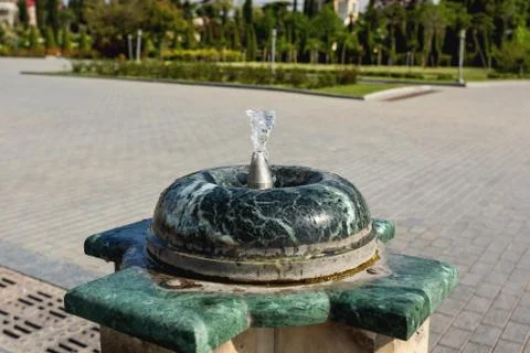 Drinking fountain on square in front of Sameba, Holy Trinity Cathedral of Tbi Stock Photos