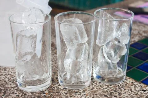 Drinking a glass of ice 3 Stock Photos