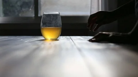 Drinking a glass of wine at table, video Video stock 77892118