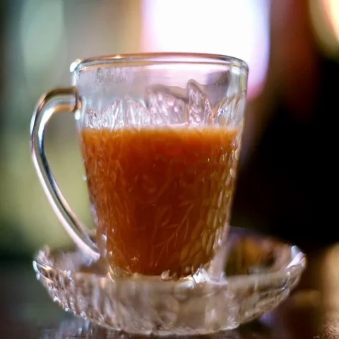 Drinking hot milk tea in cafe Video stock 69531560