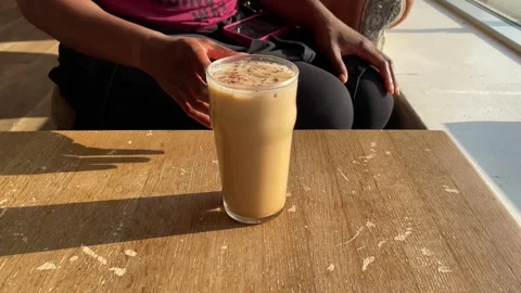 Drinking an iced tea latte Stock-Footage 249849078