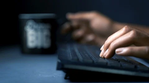 Drinking inbetween typing Stock Footage 121347541