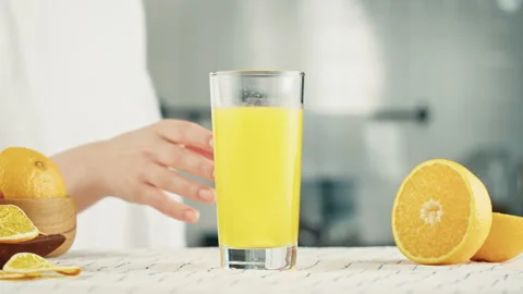 Drinking juice. Effervescent tablet vitamin C nutritional supplements in glass Stock Footage 169111159