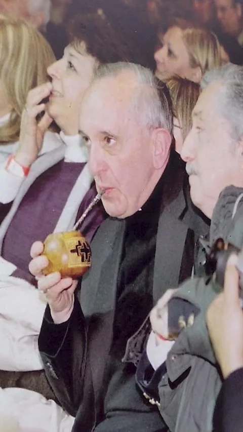 Drinking mate portrait vertical of Pope Francis, artwork in urban city public Stock Footage 327378388