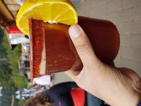 Drinking a Michelada after walking 写真素材