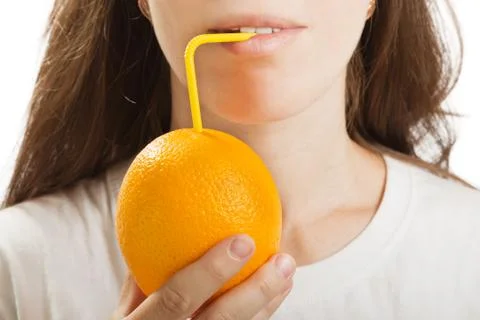 Drinking orange fruit Stock Photos