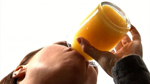 Drinking Orange Juice Stock Footage 22666742