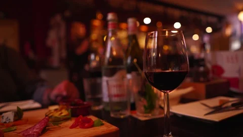 Drinking Red Wine from Table Shallow Depth of Field Video stock 92080391